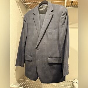 Men’s Calvin Klein suit UNWORN. 46 regular. Tailored 35/31 pants. Can go 3” long